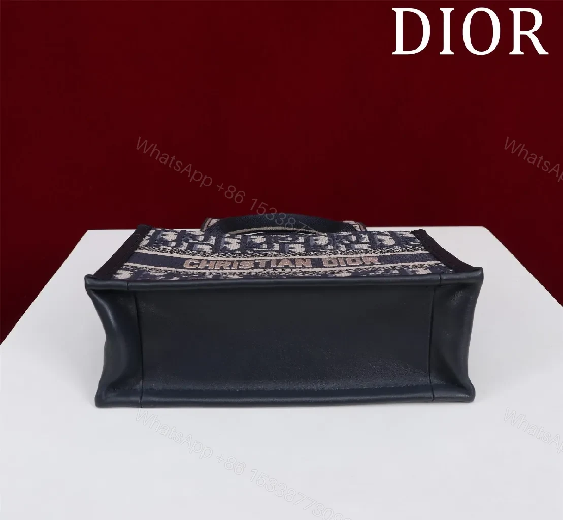 View 5 of Structured Monogram Mini Bag: Elegant Day-to-Night Crossbody