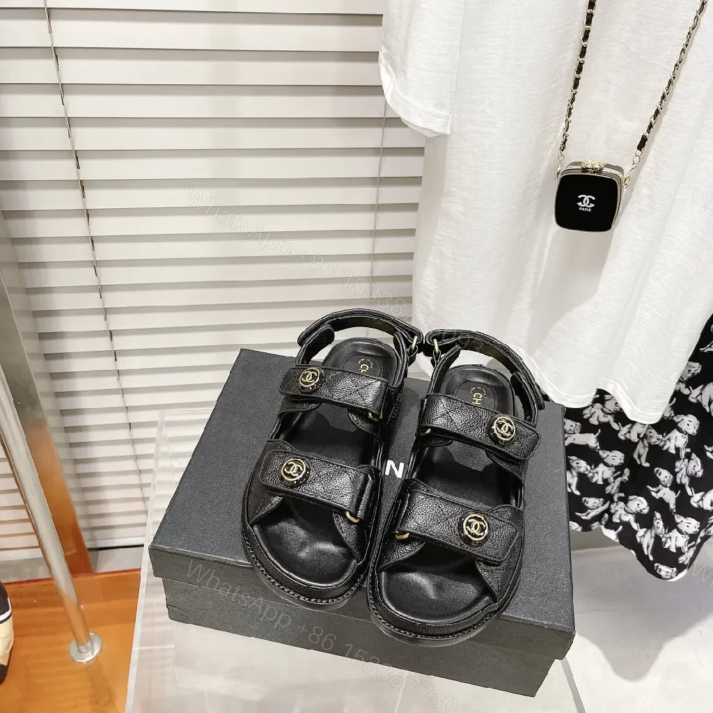 Chic Black Leather Sandals with Signature Hardware — view 1