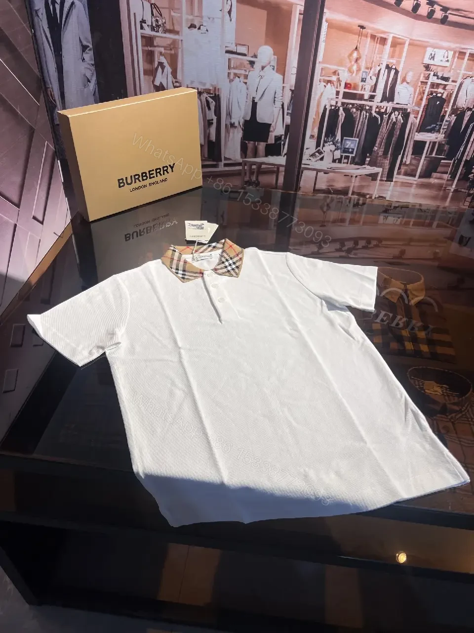 View 2 of White Piqué Polo with Signature Check Collar - Contemporary Luxury