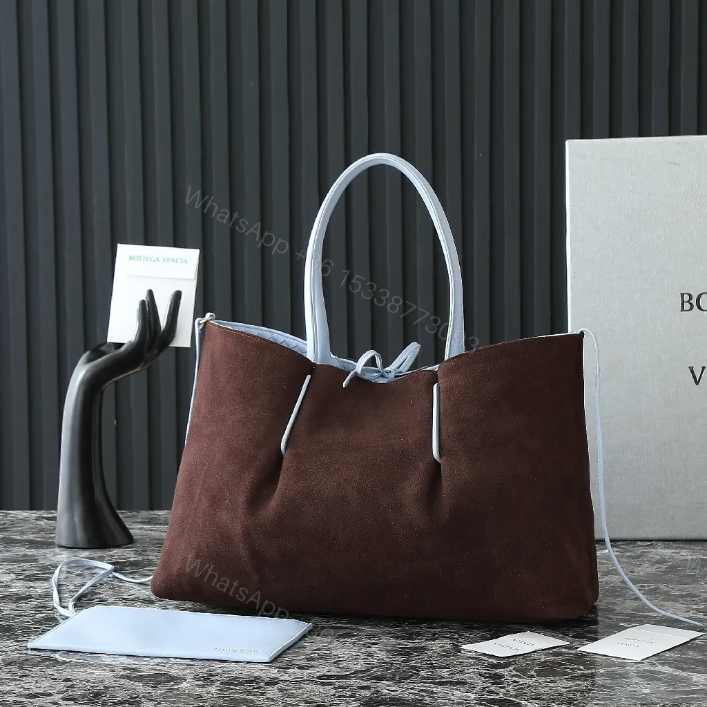 View 8 of Light Blue Woven Leather Tote: Everyday Luxe, Spacious