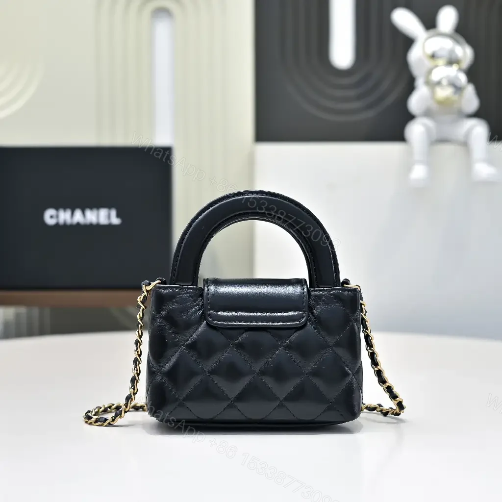 View 2 of Quilted Calfskin Mini Flap Bag: Gold Turn-Lock Luxury