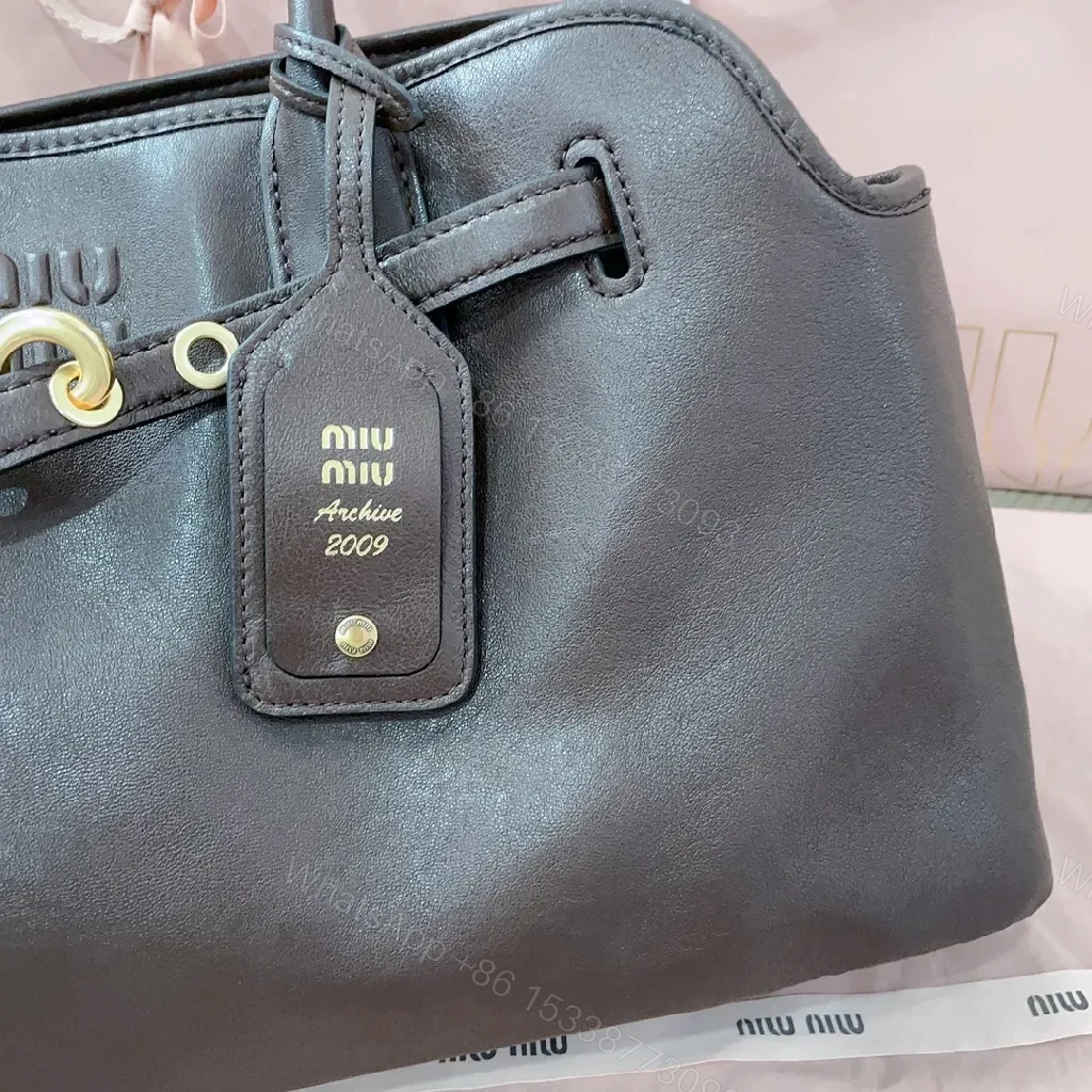View 8 of Sophisticated Leather Tote: Structured, Gold Hardware, Everyday Carry