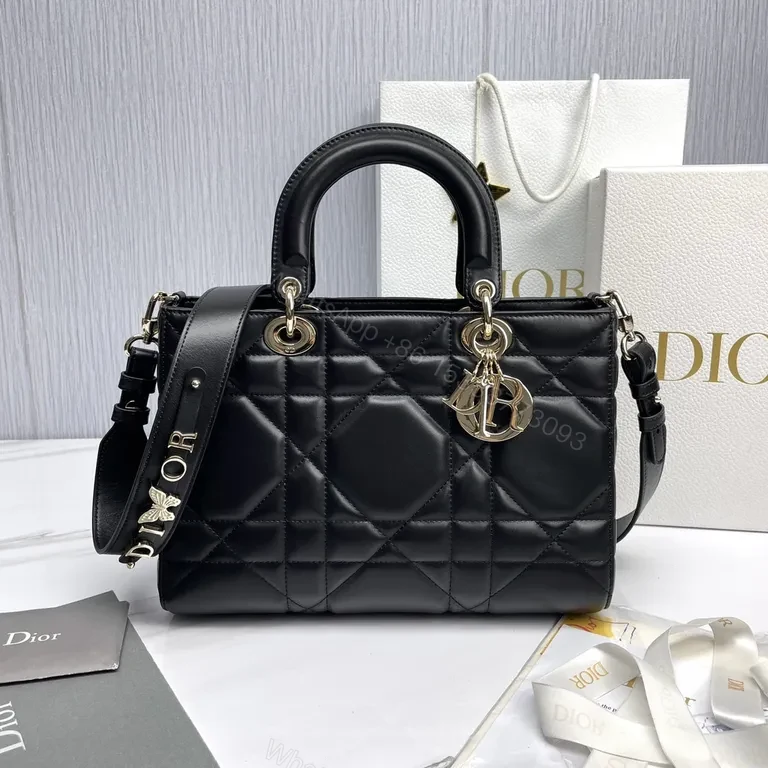 Chic Black Quilted Mini Bag with Gold Dior Charms, All-Day Luxury — view 1
