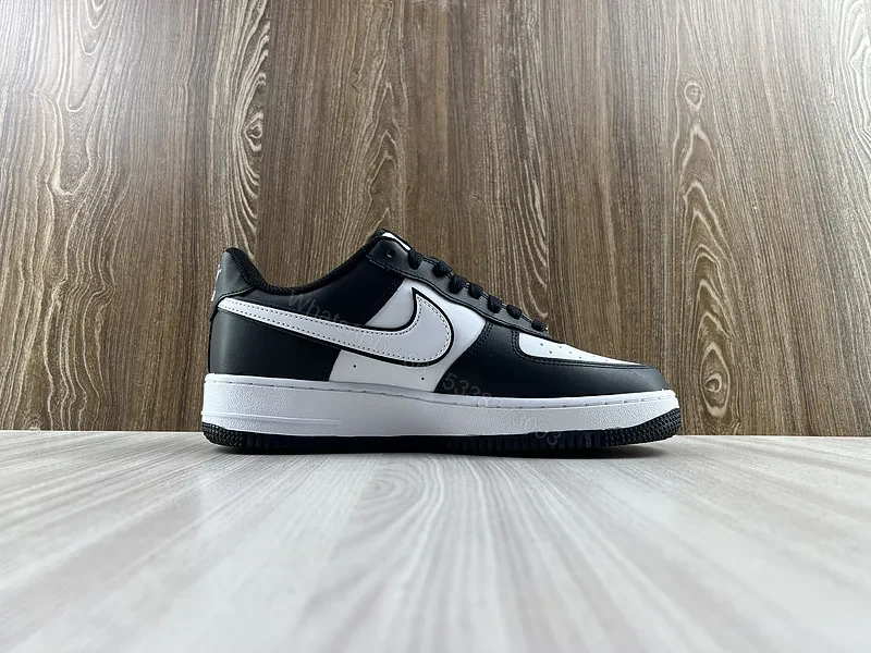 View 4 of Black Leather Low-Top Sneakers with Signature Swoosh
