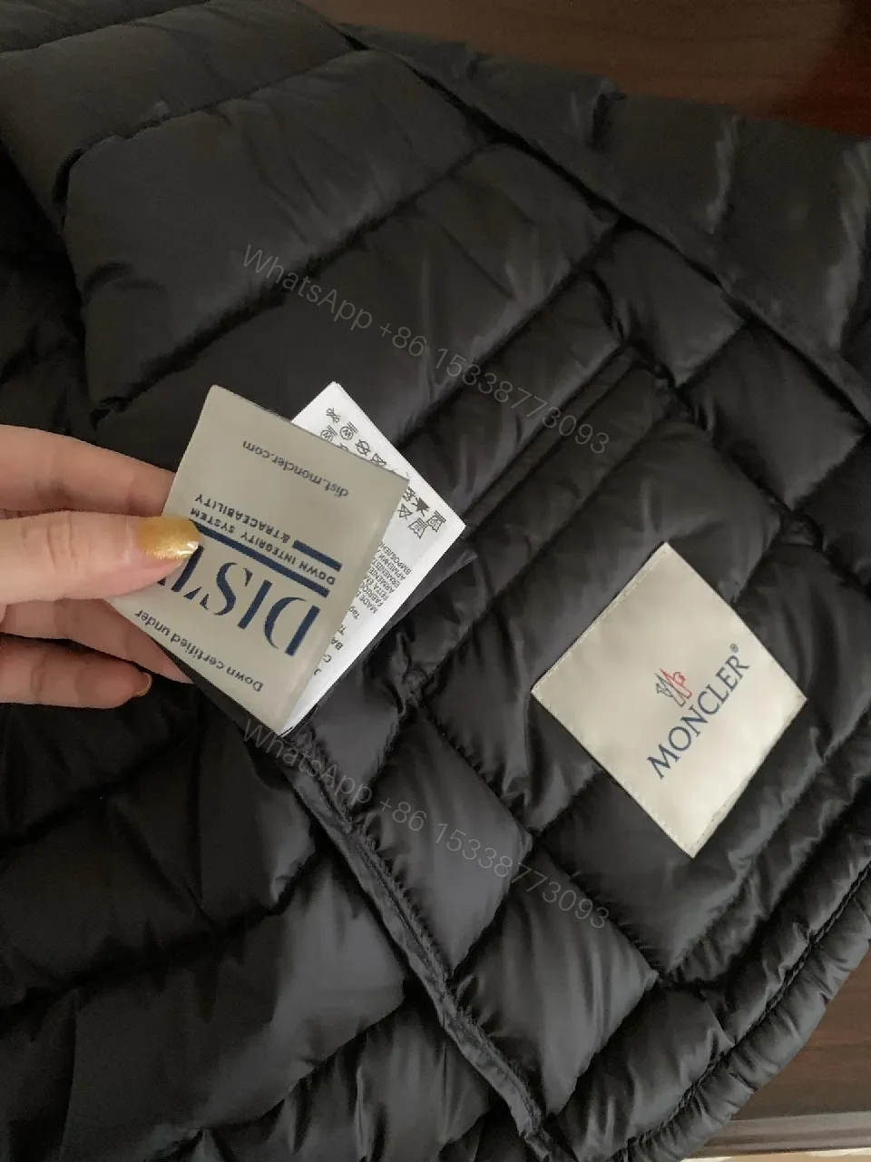 View 8 of Black Nylon Puffer Jacket: Sleek, Insulated Warmth with Patch