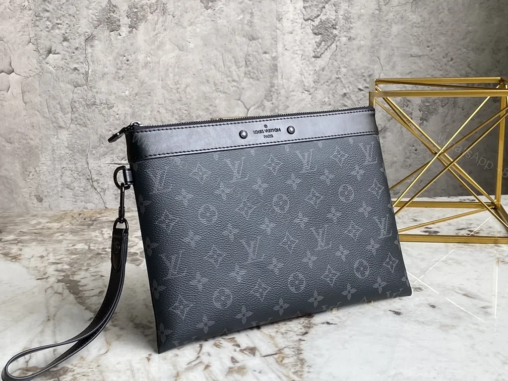 View 3 of Dark Monogram Clutch: Luxe Black Canvas, Leather Trim, Wrist Strap