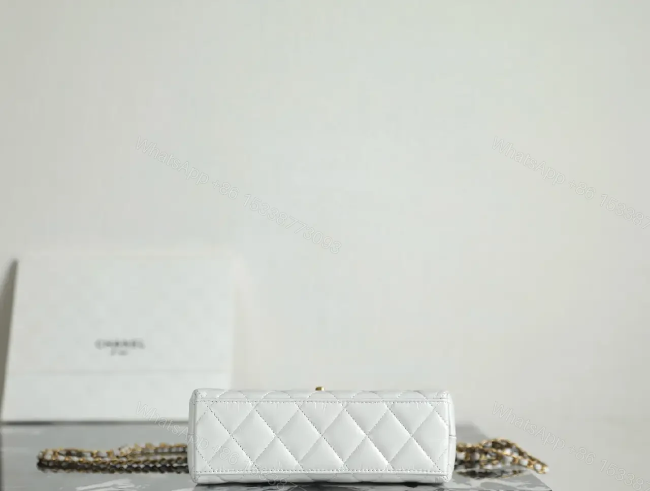 View 2 of Quilted Satchel with Gold Hardware, White, Compact Style, Crossbody-ready Bag