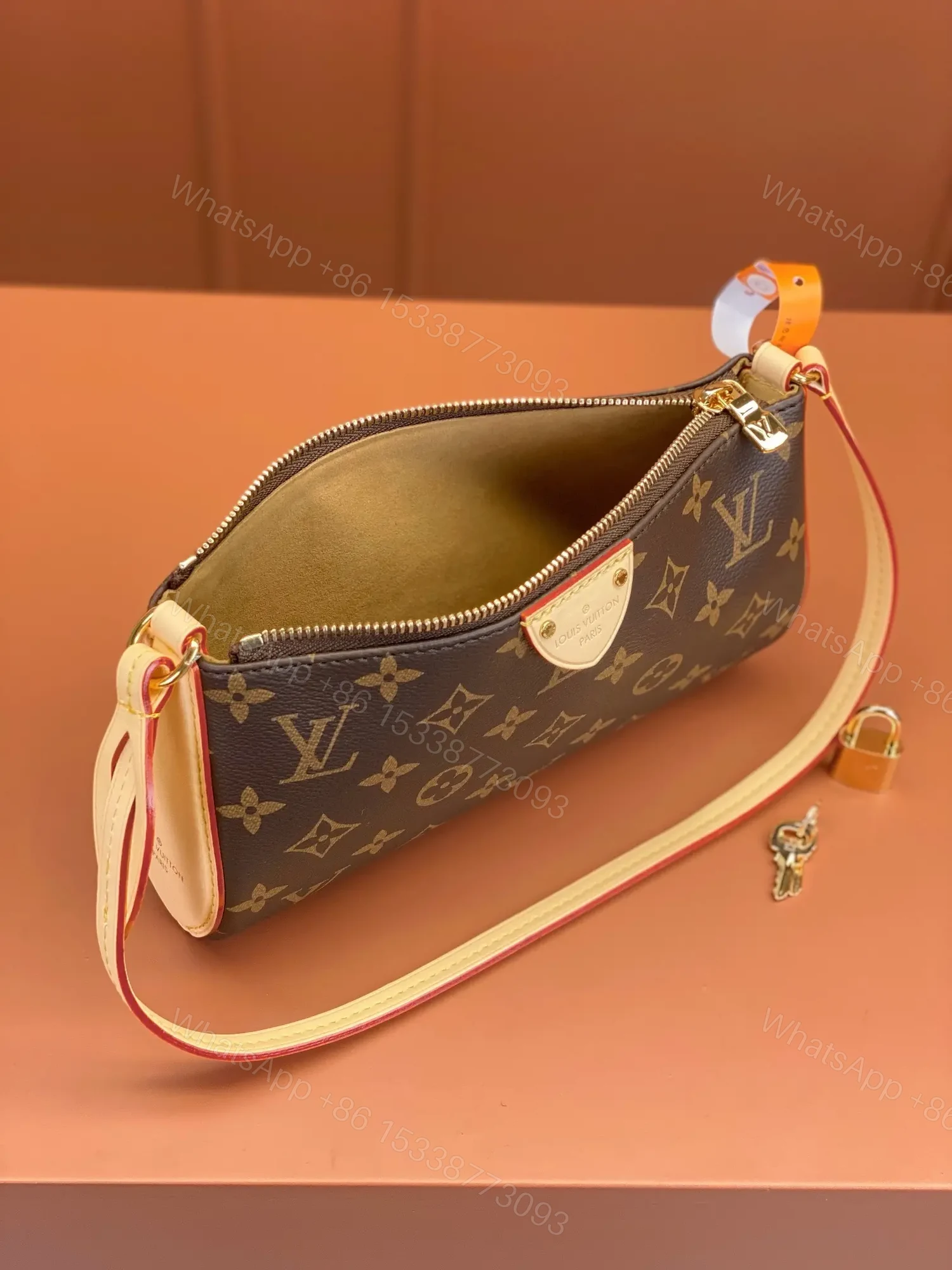 View 3 of Louis Vuitton Pochette Tirette bag in monogram coated canvas