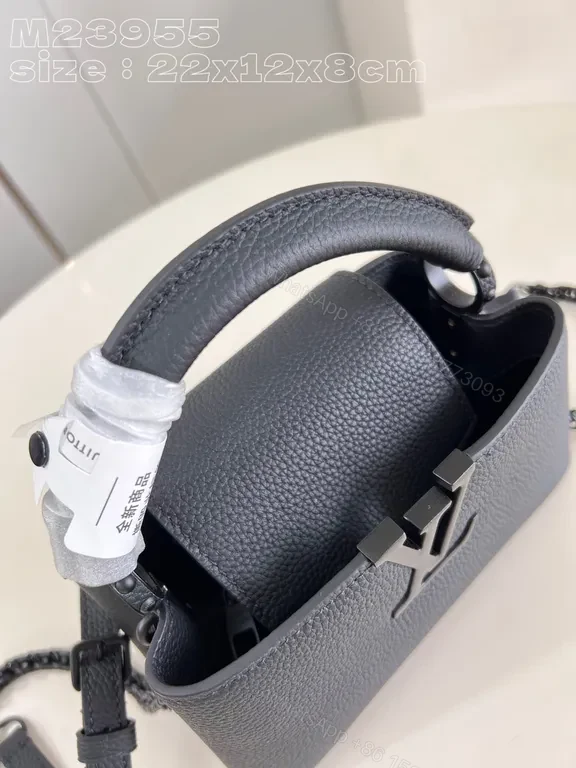 View 9 of Compact Pebble-Leather Crossbody: Monogram-Accent Bag