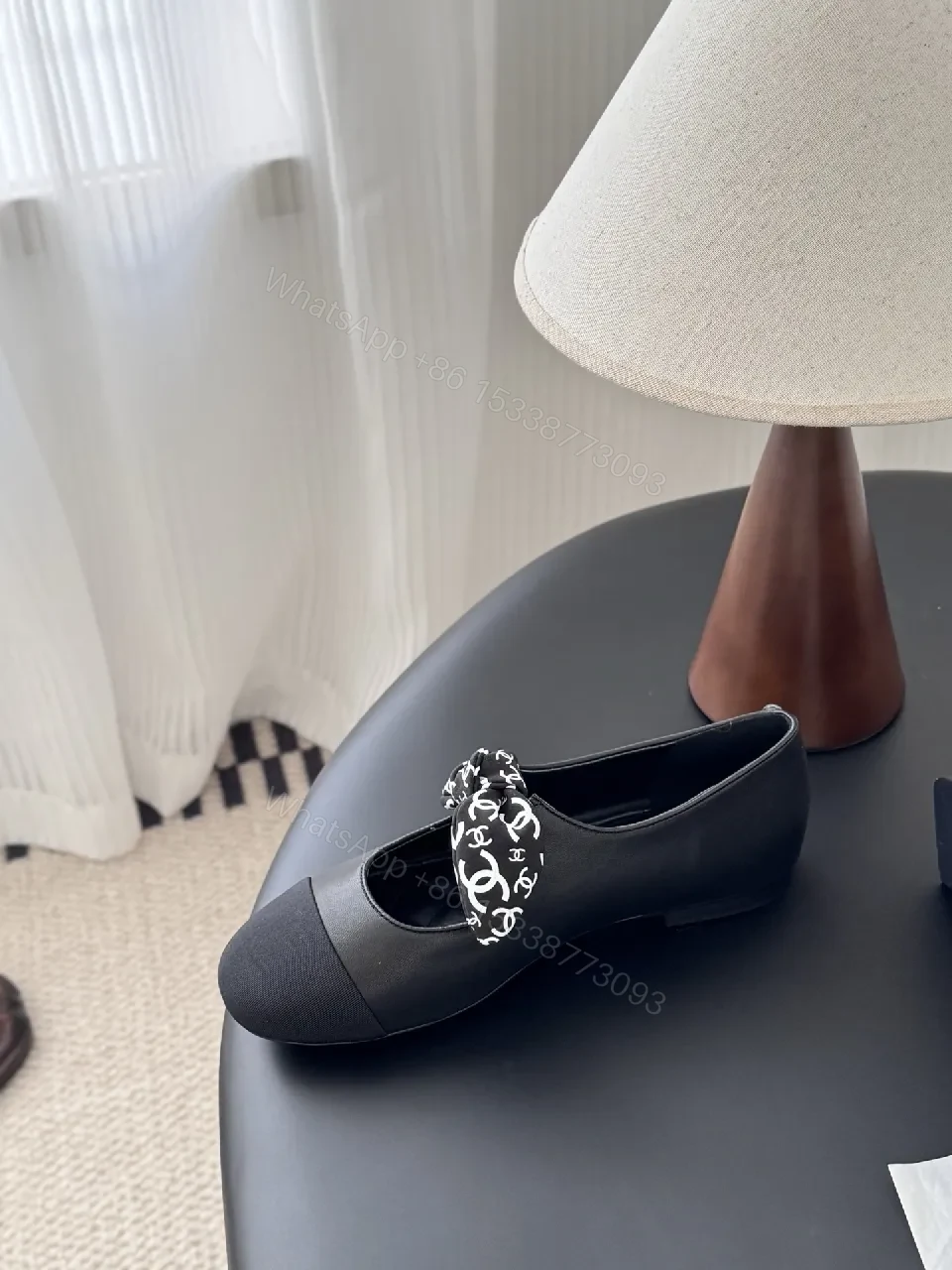 View 2 of Black Quilted Ballet Flats with Logo Bow - Chic, Comfortable Flats