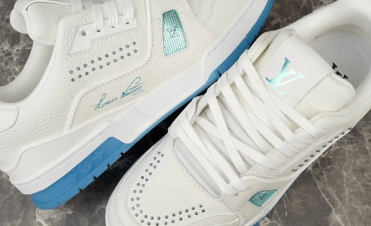 View 7 of White Leather Luxury Sneakers with Subtle LV Accents