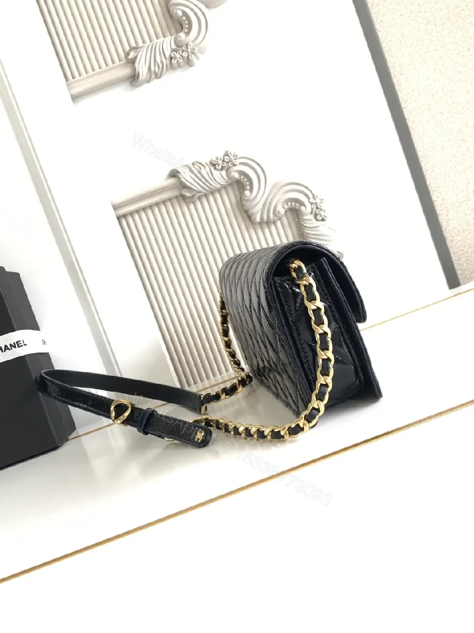 View 3 of Quilted Black Bag with Gold Hardware, Compact Shoulder Style