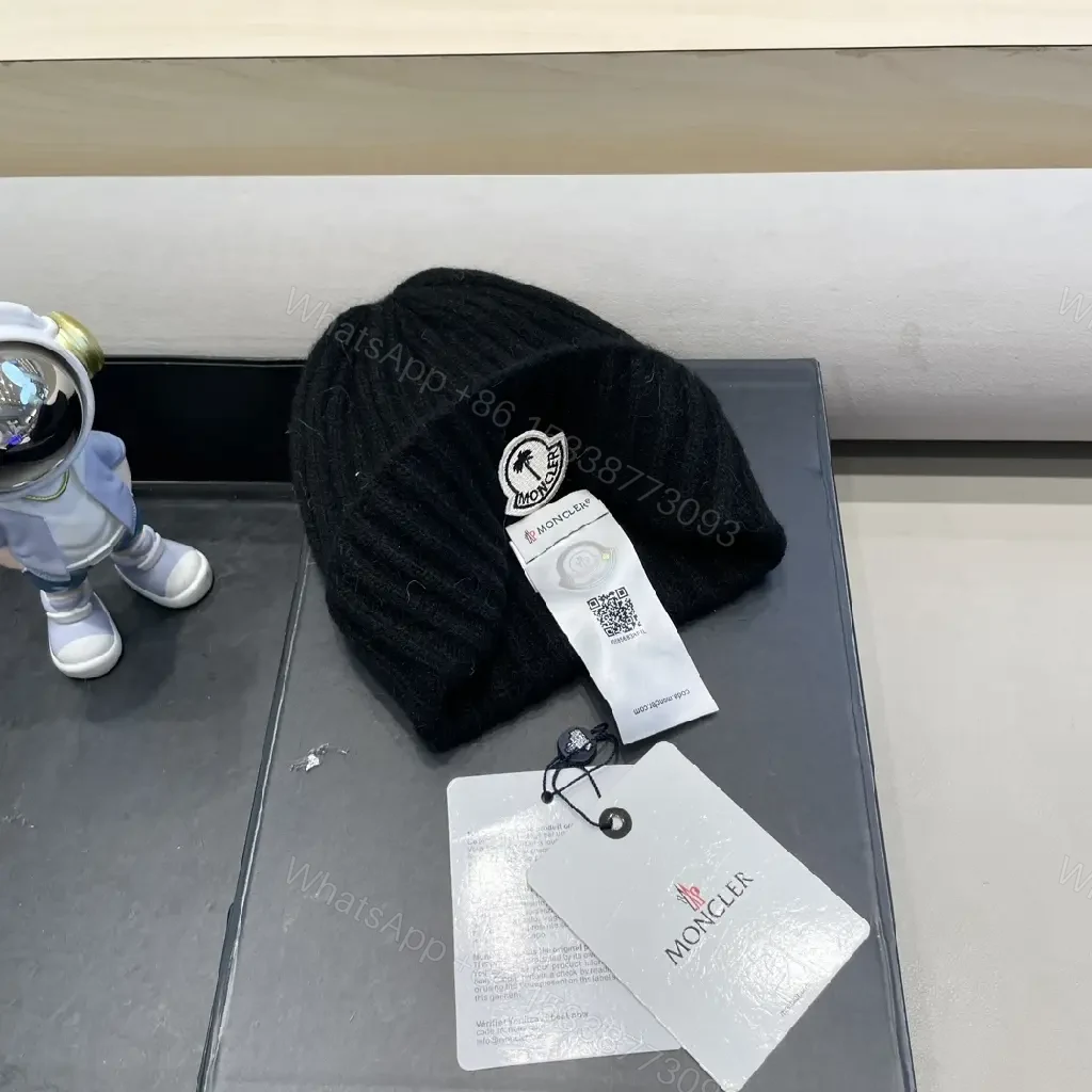 View 6 of Cozy Black Knit Beanie with Signature Patch, Luxury Style