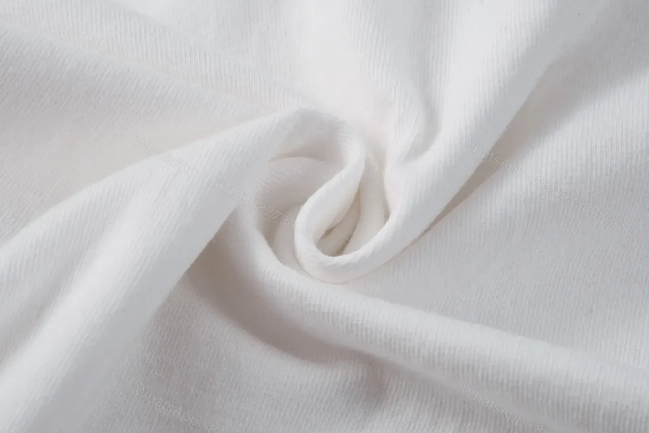 View 4 of White Cotton Minimalist Graphic Tee with Pearlescent Accent