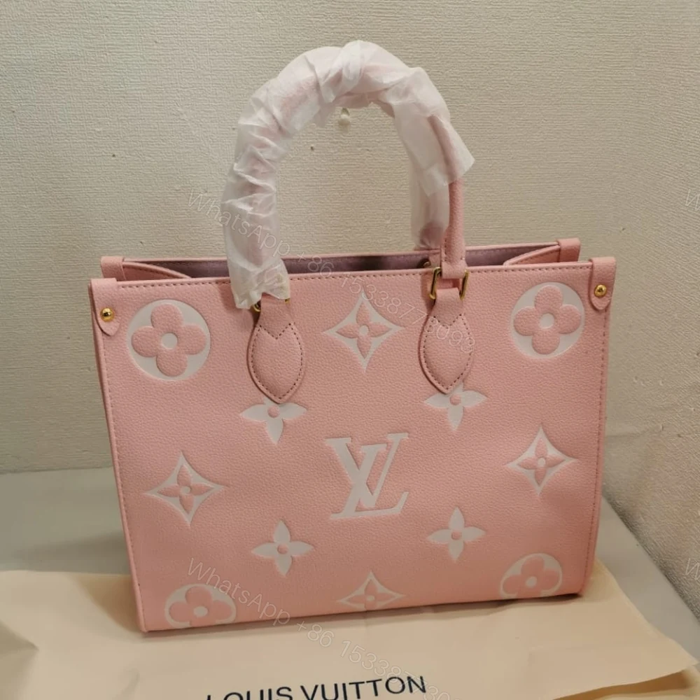 View 3 of Louis Vuitton Onthego MM Monogram Empreinte Leather Trianon Pink 33Cm M46286