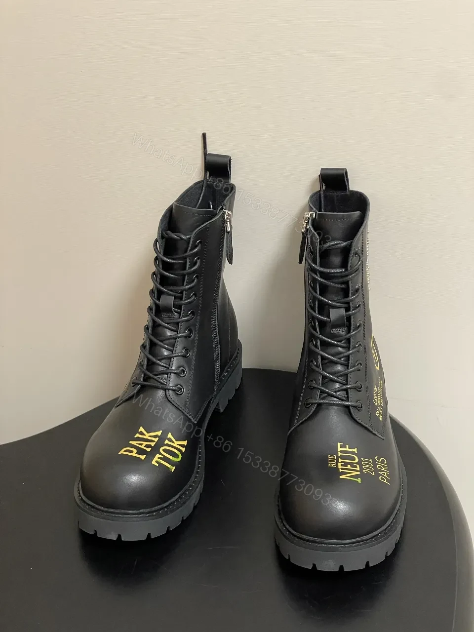 View 7 of Bold Black Combat Boots with Gold Detailing: All-Day Comfort