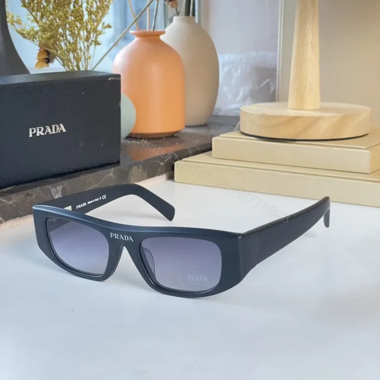 Bold Prada Sunglasses: Black Acetate, Rectangular, UV400 Protection — view 1