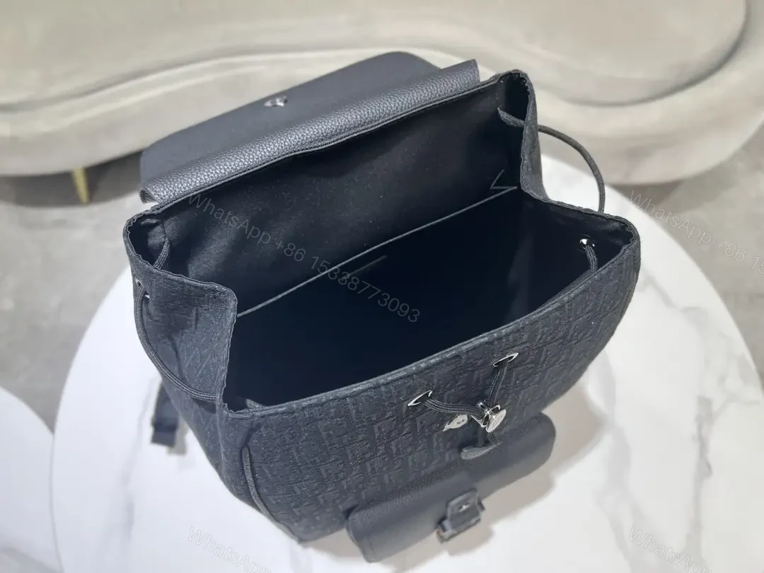 View 5 of Compact Black Structured Backpack with Hidden Essentials