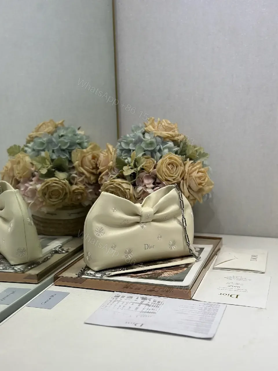 View 3 of Chic Nappa Leather Mini Handbag with Bow Embroidery