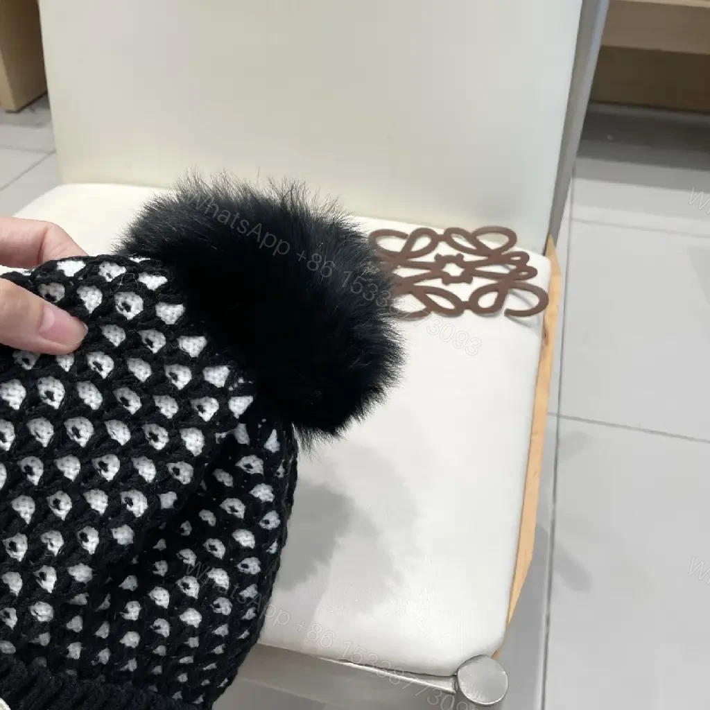 View 2 of Chic Knit Beanie: Textured Warmth with Pom Pom
