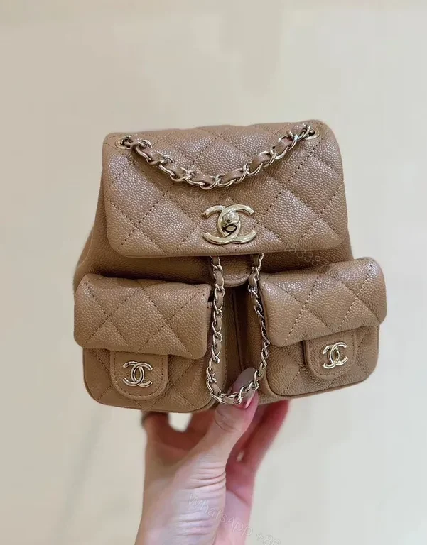 Quilted Tan Mini Backpack: Luxe Chain-Detail Satchel — view 1