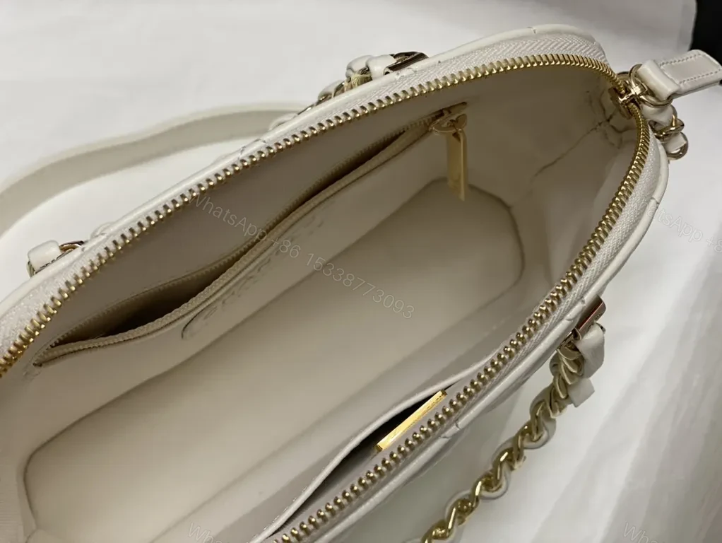 View 9 of Mini Quilted Luxe Mini Bag: Gold Hardware, Top Handle + Chain
