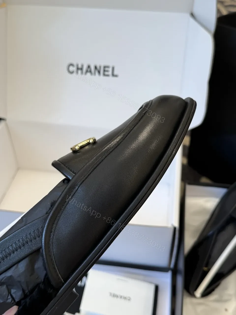 View 2 of Sleek Leather Loafers: Timeless Chic with Gold Logo Hardware