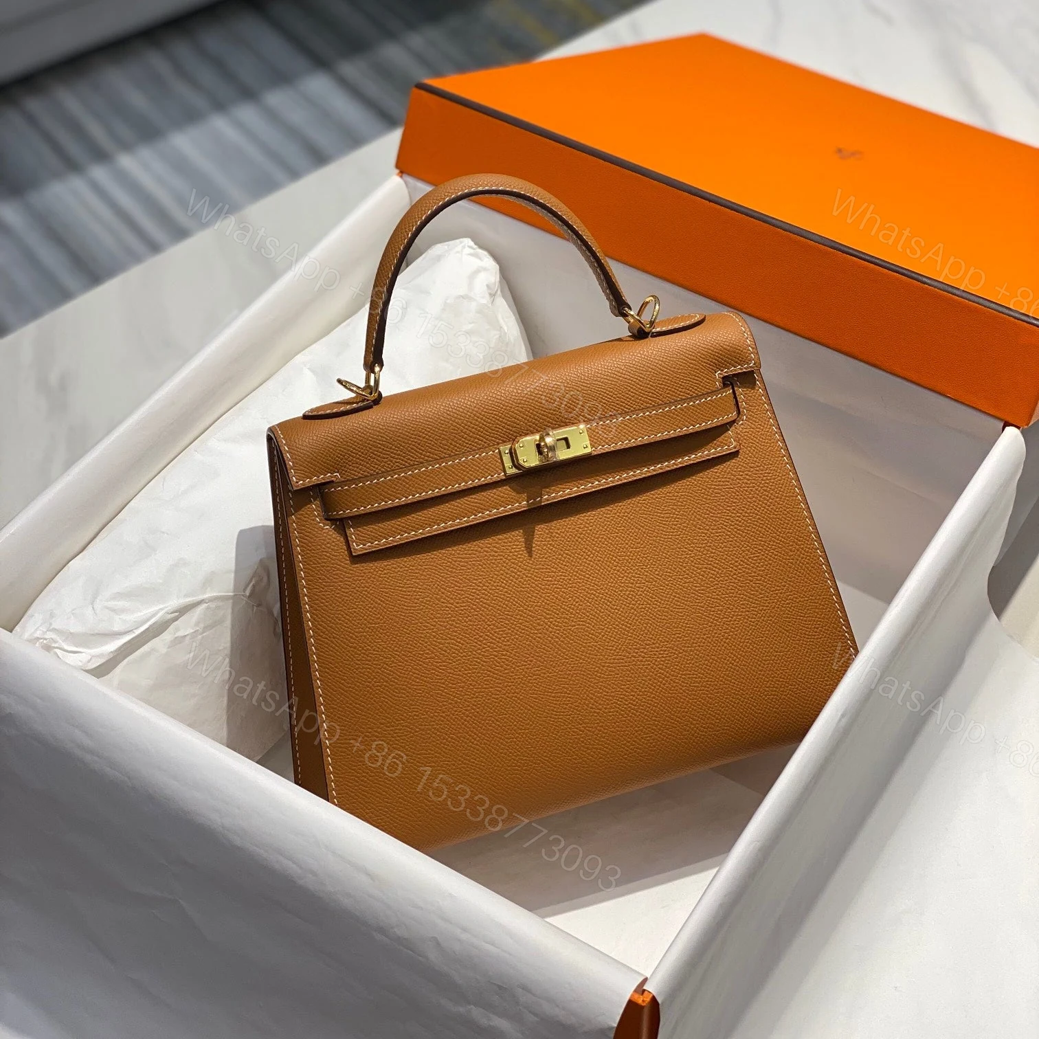 KELLY 28CM IN GOLD EPSOM GOLD HARDWARE — view 1
