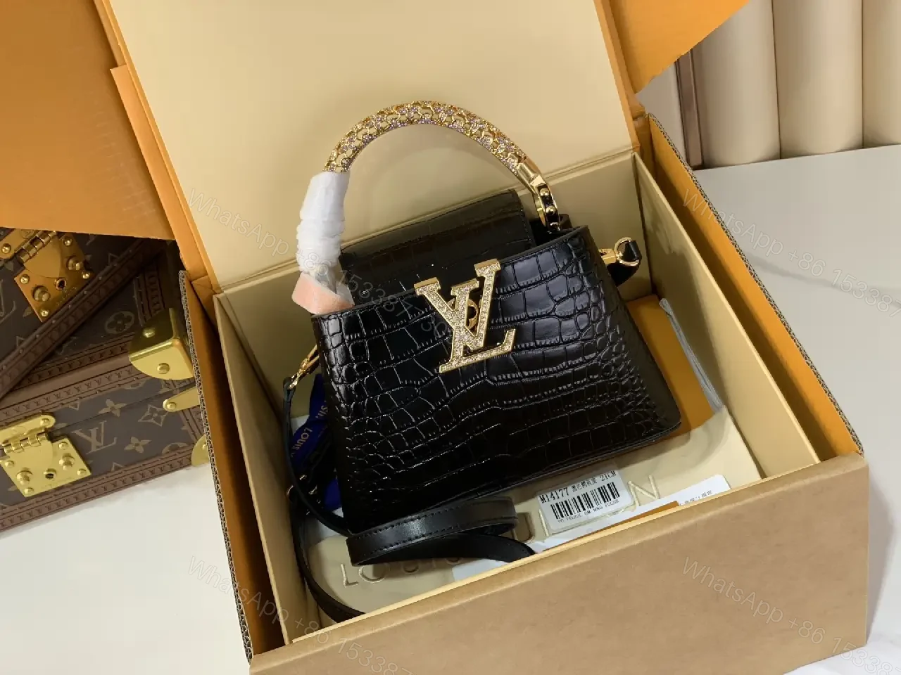 Chic Black Crocodile-Embossed Mini Handbag with Gold Hardware — view 1