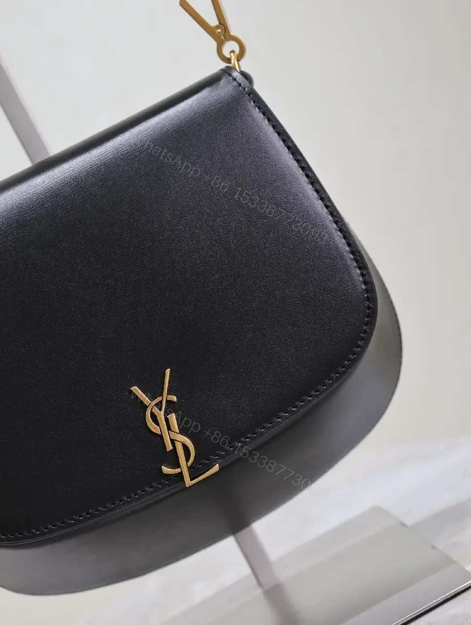 View 10 of Structured Leather Crossbody with Gold Emblem, Compact & Versatile Bag