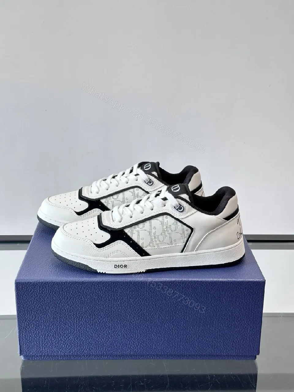 View 7 of White-Black Leather Sneaker with Graphic Texture, Cushioned Comfort