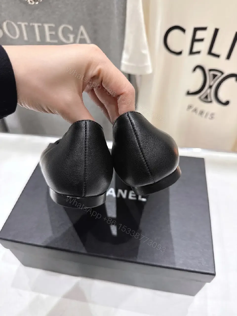 View 8 of Chic Black Leather Slip-Ons with Quilted Toe Comfort Flats