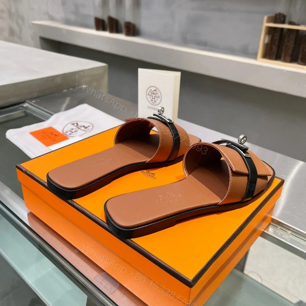 View 6 of HERMES GIULIA SANDAL GOLD AND NOIR H231056Z 20360