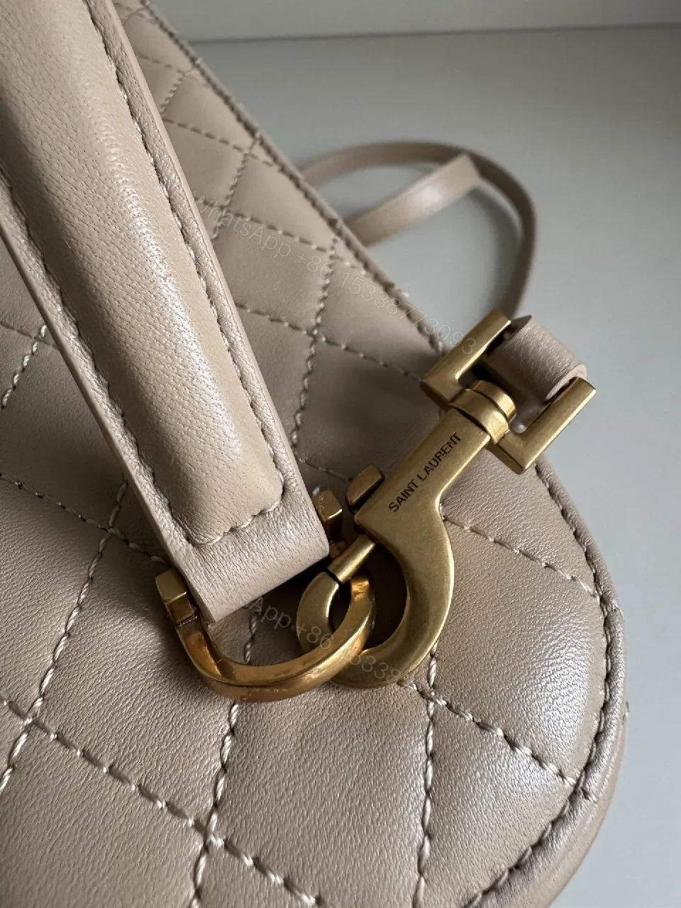 View 7 of Quilted Blush Mini Bag with Gold Hardware, Elegant Crossbody