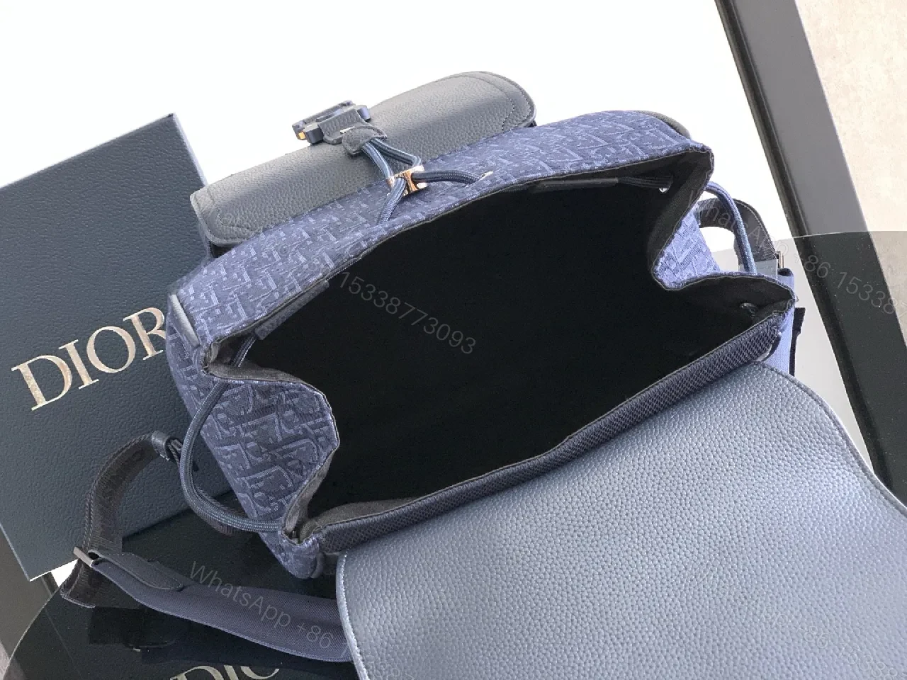 View 6 of Navy Monogram Leather-Trim Compact City Backpack