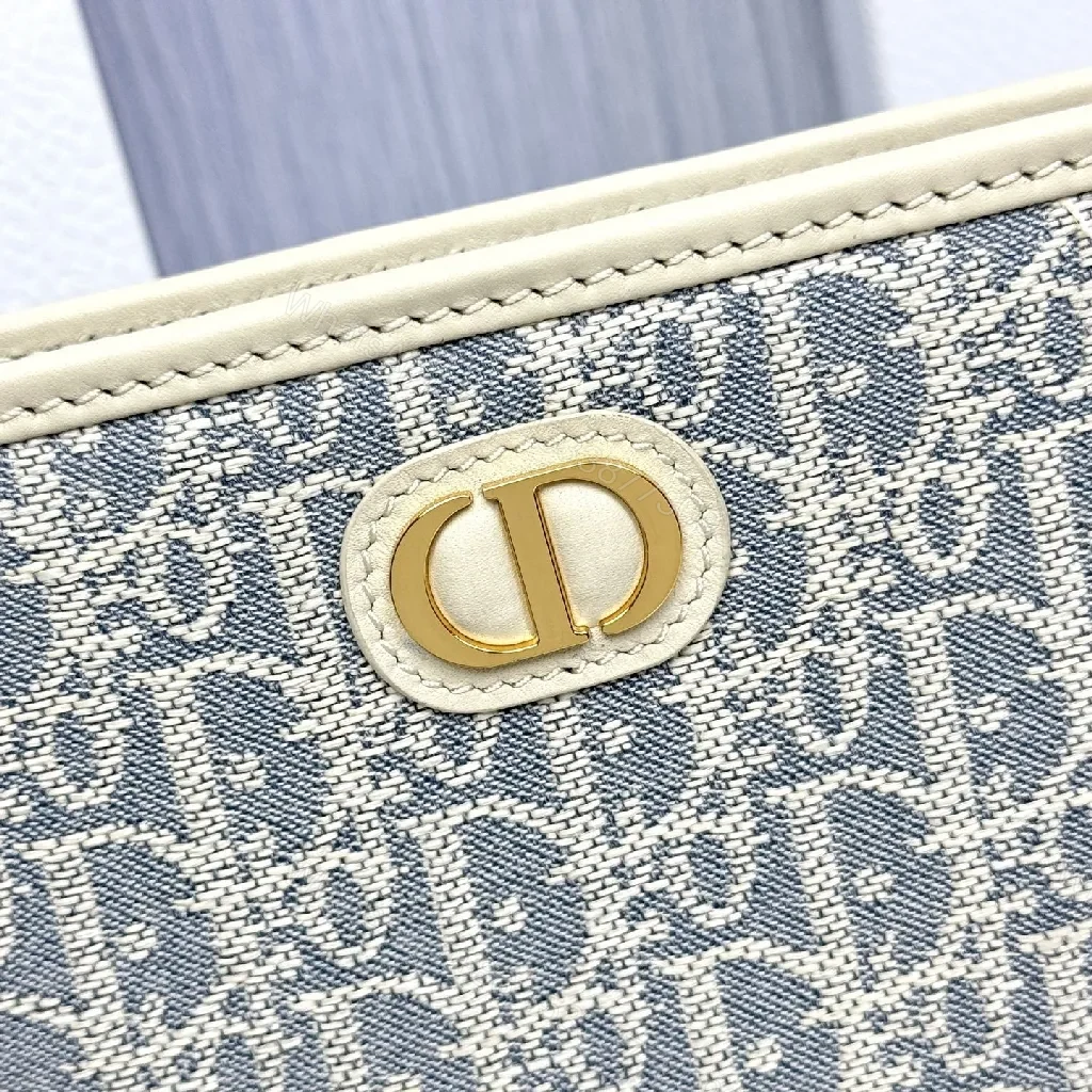 View 6 of Textured Monogram Carryall: Structured Luxury Handbag