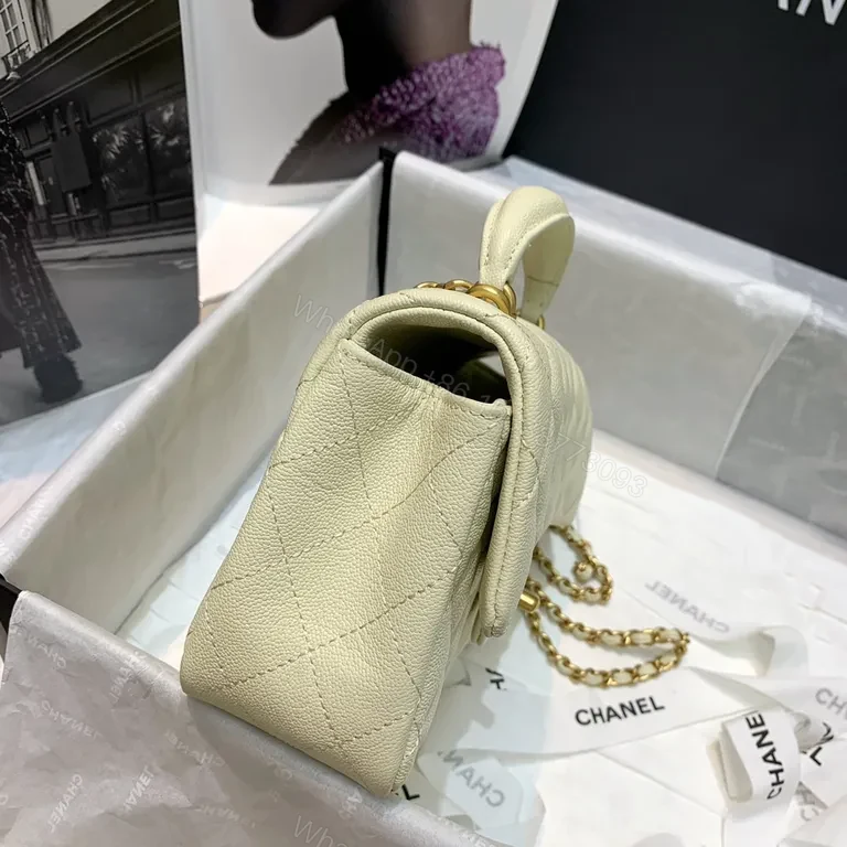 View 6 of Compact Quilted Handbag with Gold Chain Strap - Timeless Luxury