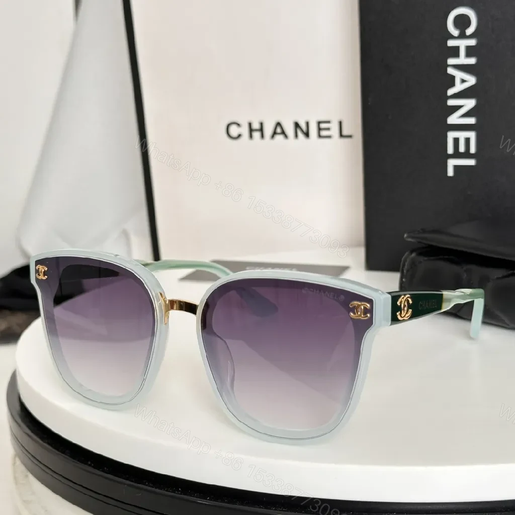 View 7 of Glossy Black Cat-Eye Sunglasses with Gold Accents & Red Temples
