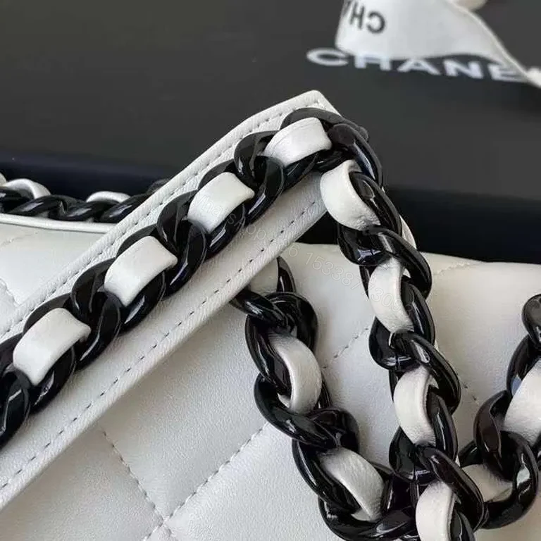 View 3 of Quilted White Chain-Accent Flap Bag â€” Luxury Compact Tote