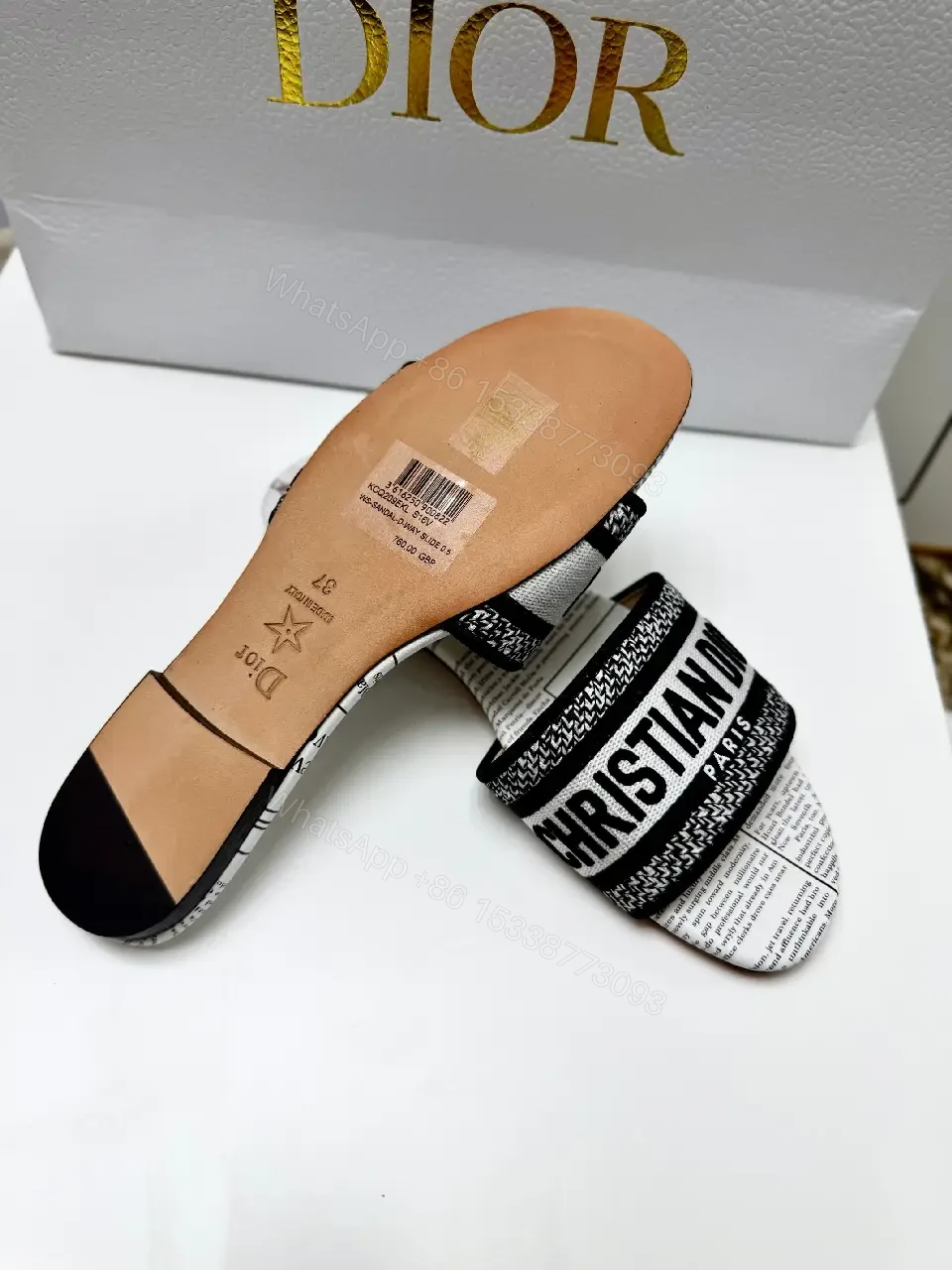 View 6 of white textile slide sandal with monogram pattern luxury logo strap for everyday luxury