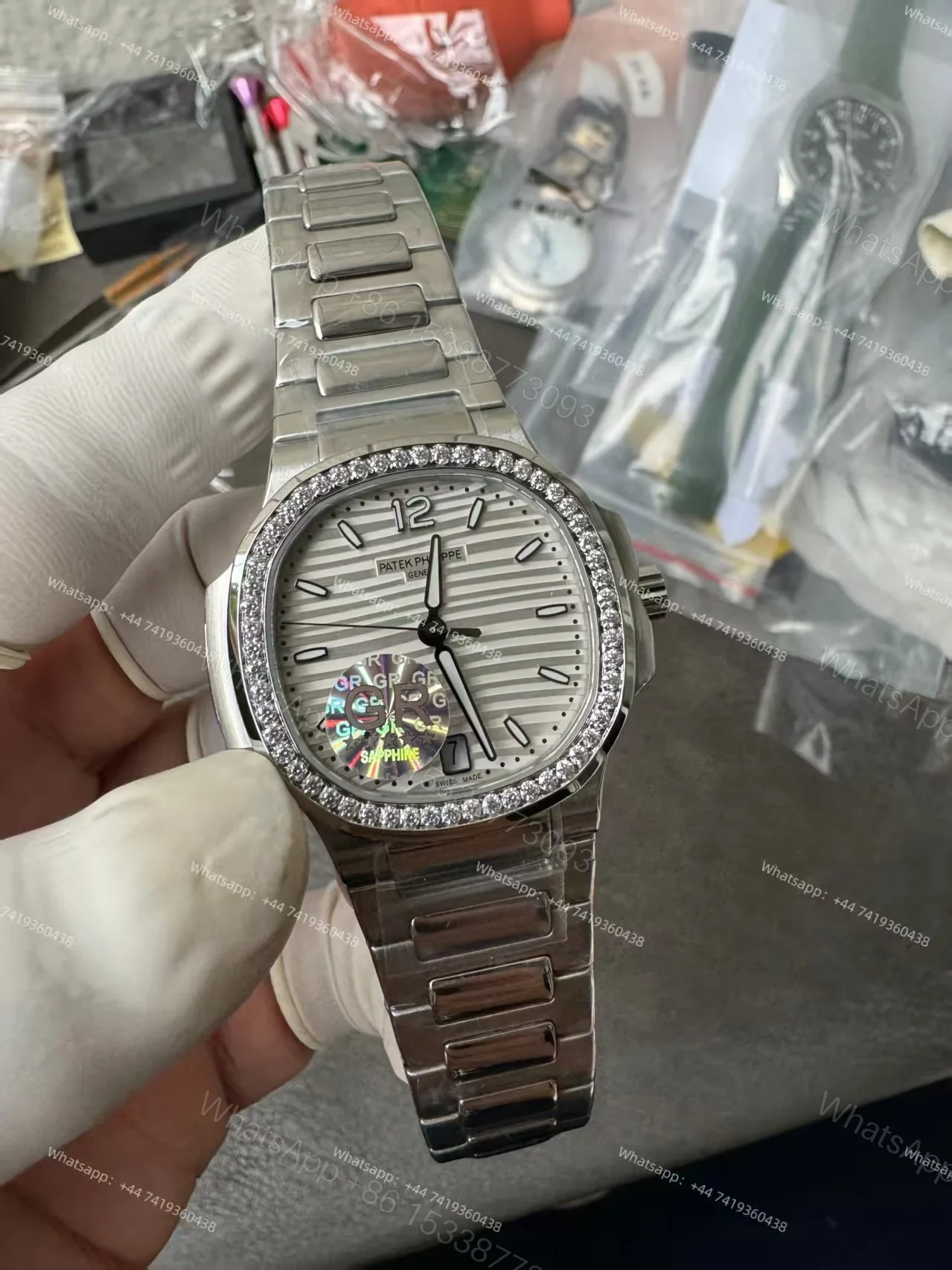 View 9 of Patek Philippe Super Clone Nautilus 7118/1200A-010 White Dial Diamond Bezel 35.2mm