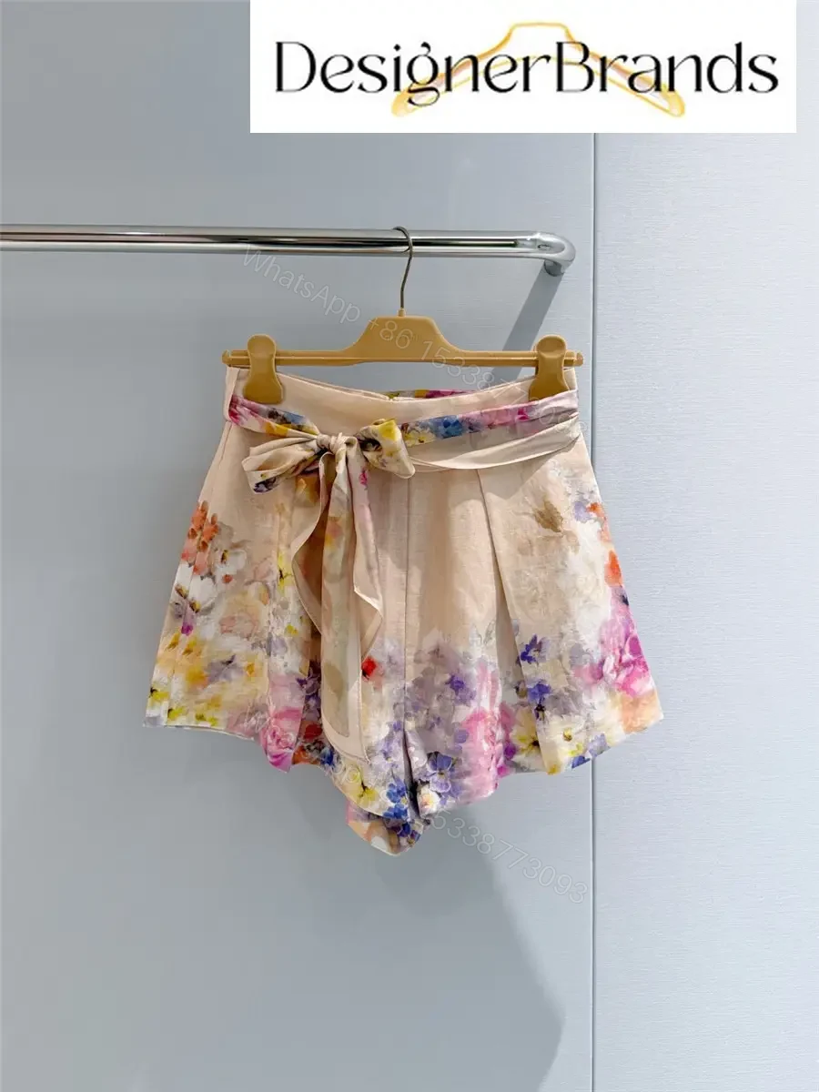 Zimmermann Crush Tuck Floral Linen Shorts — view 1