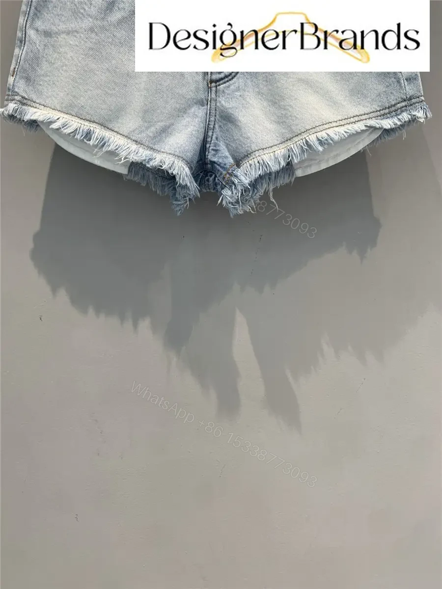 View 3 of Loewe Light Blue Cotton Denim Shorts