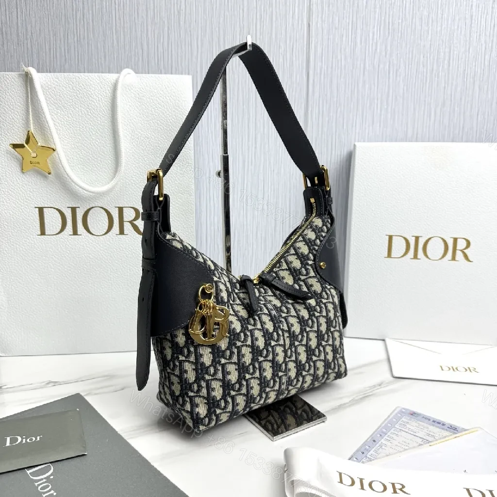View 5 of Monogram Textured Bucket Bag: Black Leather Trim, Gold Hardware, Medium