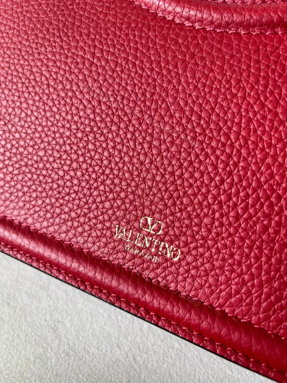 View 2 of Vibrant Red Pebbled Leather Box Bag with Gold Hardware