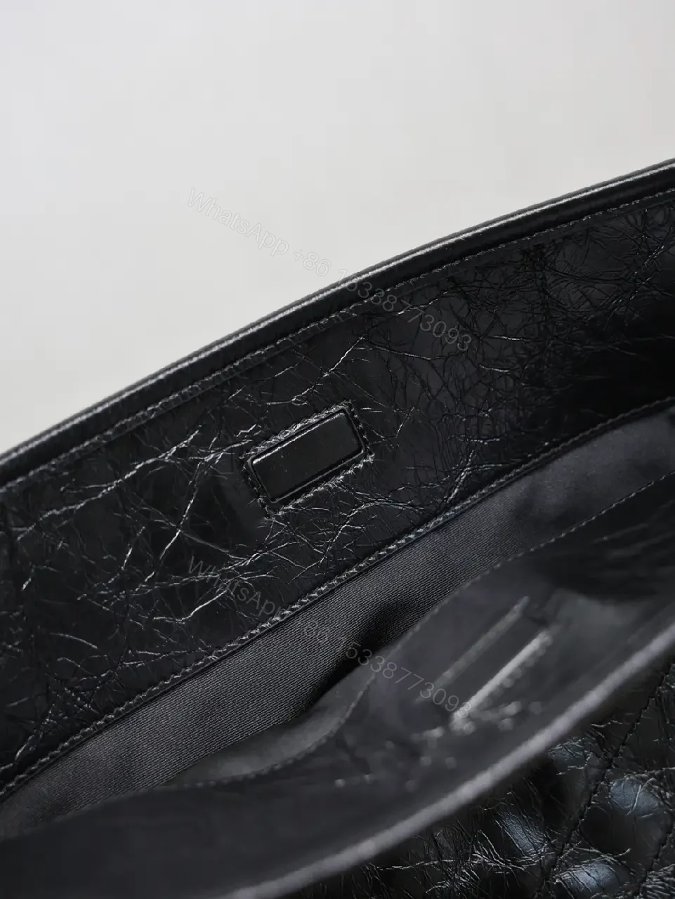 View 9 of Quilted Black Tote with Gold Logo—Luxury Everyday Carry