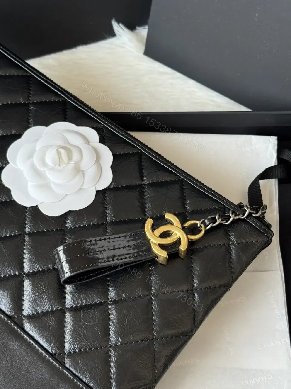 View 9 of Quilted Leather Clutch: Sophisticated, Multi-Use Night Bag