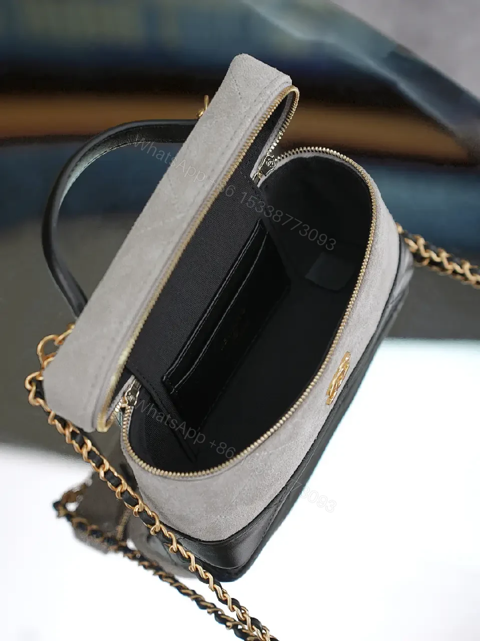 View 5 of Suede-like Gray Mini Handbag with Gold Accent