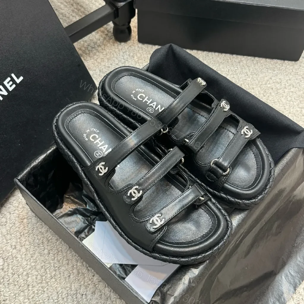 Minimalist Black Leather Sandals with Subtle Logo Hardware — view 1