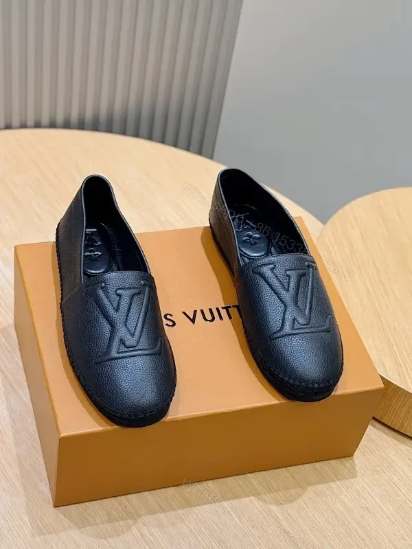 Textured Leather Loafers: Subtle Monogram, Modern Comfort — view 1